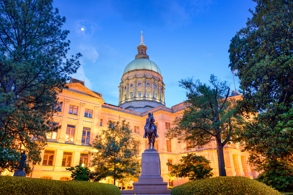 Dusk view of Georgia’s legislative center, used in coverage of Senate Bill 68 and tort reform.